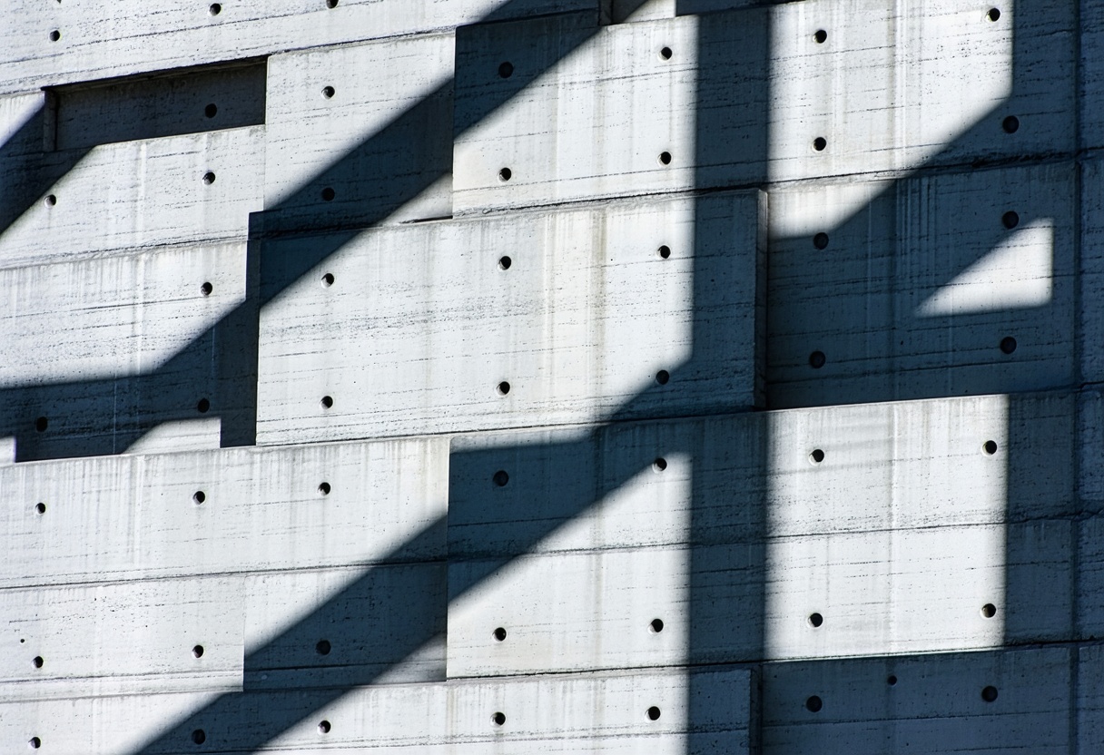 Architectural concrete grid structure with strong geometric light and shadow